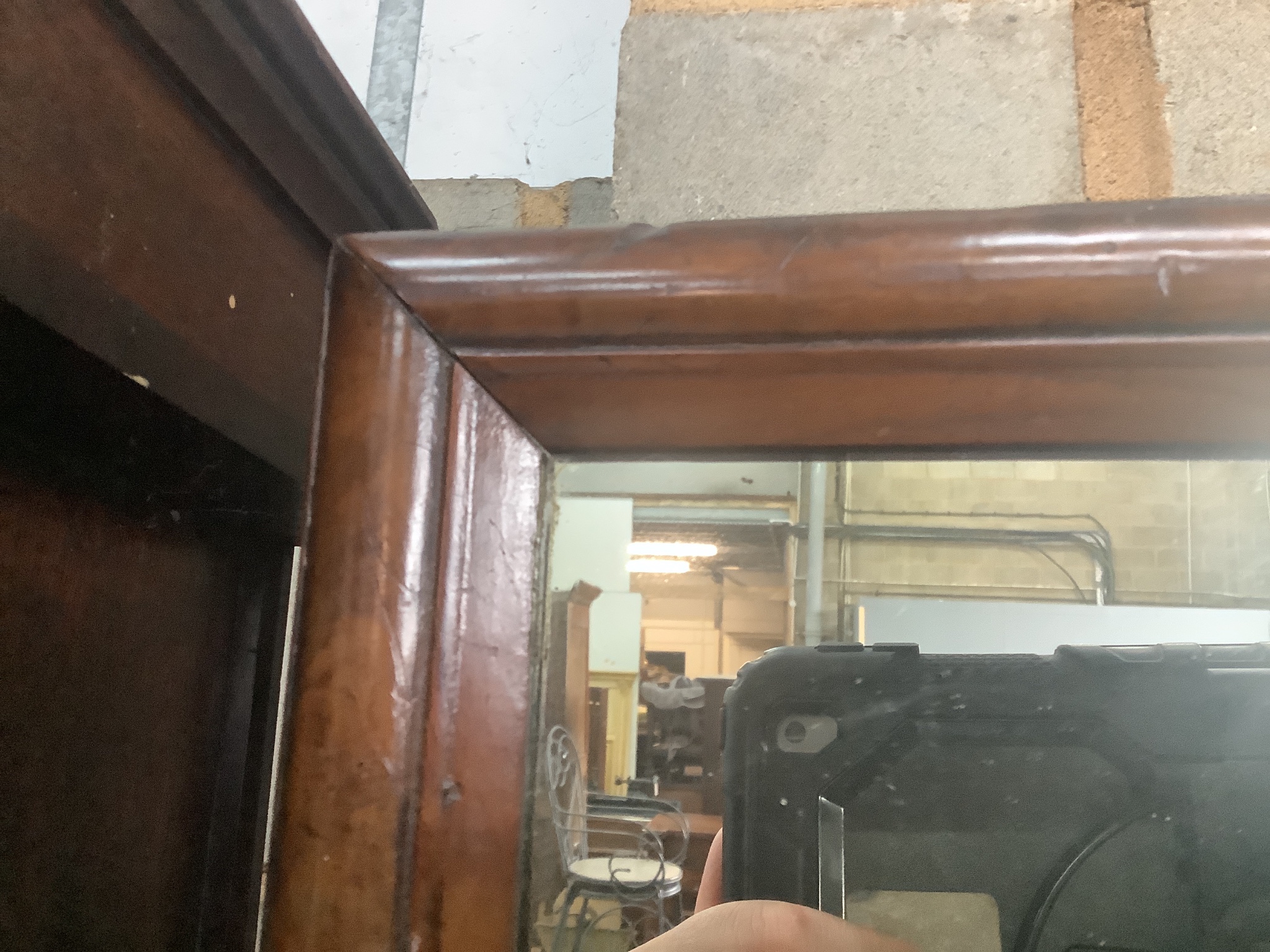 A rectangular walnut framed wall mirror, width 47cm, height 60cm